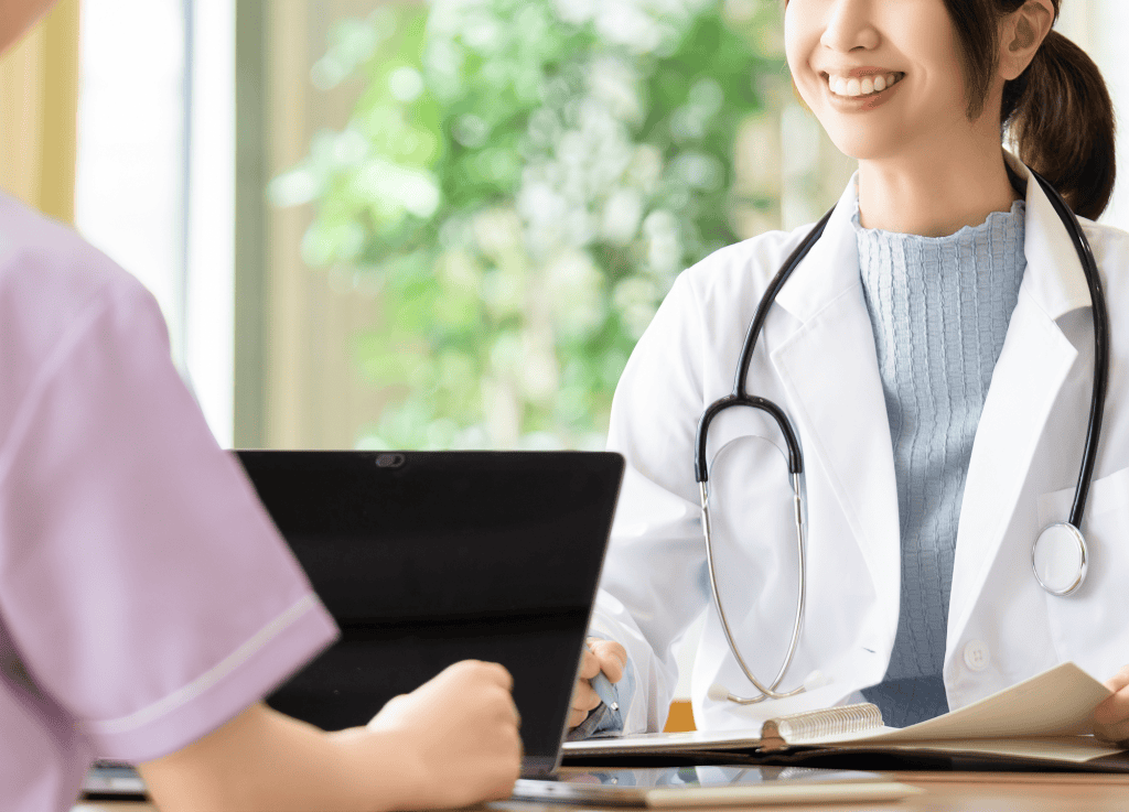Gulf coast healthcare professionals, patient consultation, medical doctor with stethoscope, healthcare services in Gulf Coast region, friendly doctor offering medical advice.